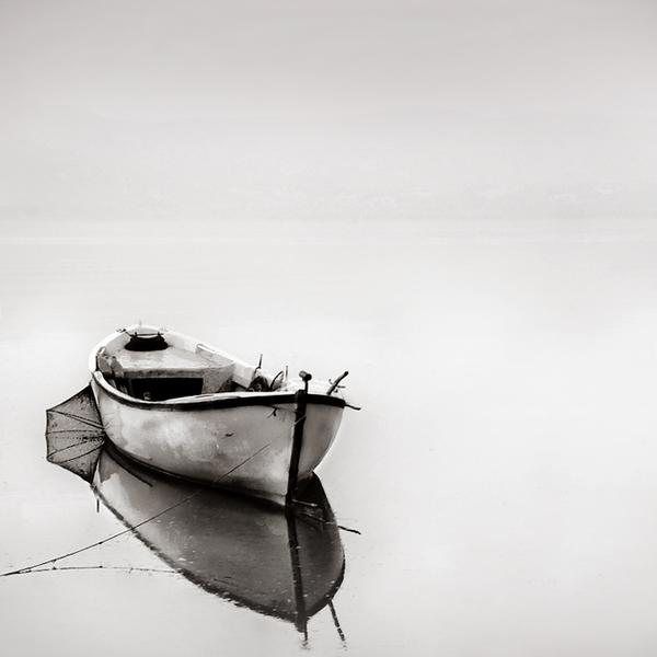 boat in mist.. by Nilgun Kara