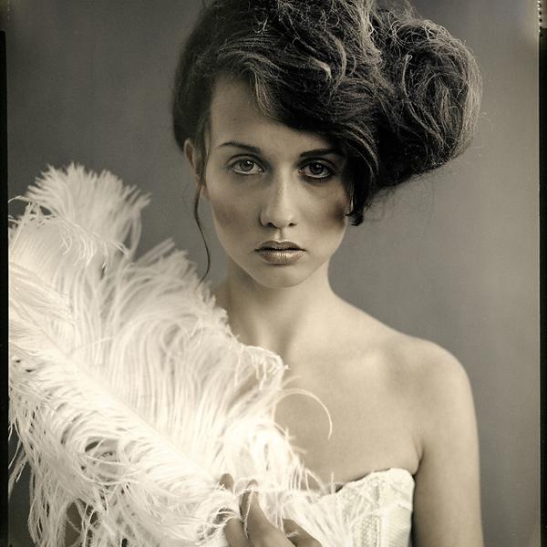 Feather by Piotr Biegaj