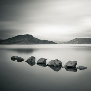 Little rocks in the lake by Emmanuel Correia