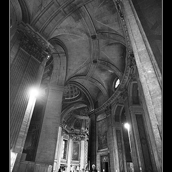 Looking for the key stone, photography by Chris Cussat-blanc. I was here to take picture of the repetition of a classic concert taking place in the now famous church Saint Sulpice in Paris. But you know what it is, musicians weren't all here and I got same couple of quaters to take pictures in church. Several tourist were there to visit this beautiful place but some were not here for the church but because of the keystone.... Canon EOS-1Ds Mark II. Black and white. In Construction, Interior
