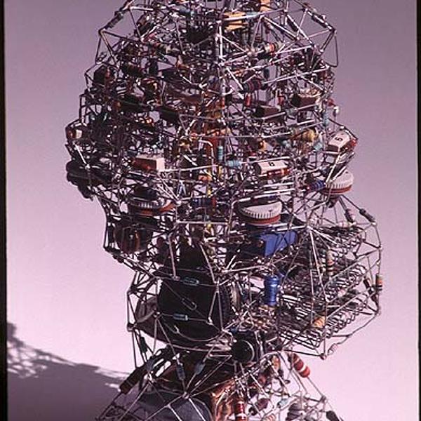 Truc-Bidule, sculpture by Philippe Fassier. J'ai d'abord construit cette sculpture pour m'amuser &agrave; manipuler divers montages &eacute;lectroniques, certaines produisant des sons, d'autres r&eacute;agissant &agrave; la lumi&egrave;re, &agrave; la conductivit&eacute; de la peau... Le tout en accumulant des r&eacute;cup&eacute;rations h&eacute;t&eacute;roclites (touches de calculatrices, boutons et potentiom&egrave;tres de radios, etc.). Finalement, je l'ai offerte &agrave; ma s&oelig;ur Martine qui pouvait avoir huit ou dix ans, en pensant que &ccedil;a l'amuserait de jouer avec une sorte de ... machin qui fait du bruit quand on le touche, quand on le tourne ou quand on l'&eacute;claire.. Touches de calculatrices, potentiom&egrave;tres, r&eacute;sistances, cellules, transistors, condensateurs, haut-parleurs, loupiottes, fil-de-fer, piles, circuits &eacute;lectronique, etc.... Soudure. In Object, Sculpture