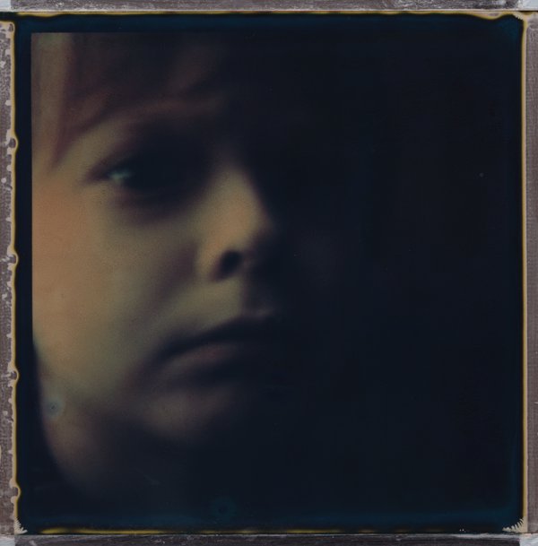 The Bright Side Of The Moon, photography by Elinor Scott-sutter. sx -7-0, fade to black film, paring knife. tore a part and put back together photo to arrest developing. In People, Portrait, Male