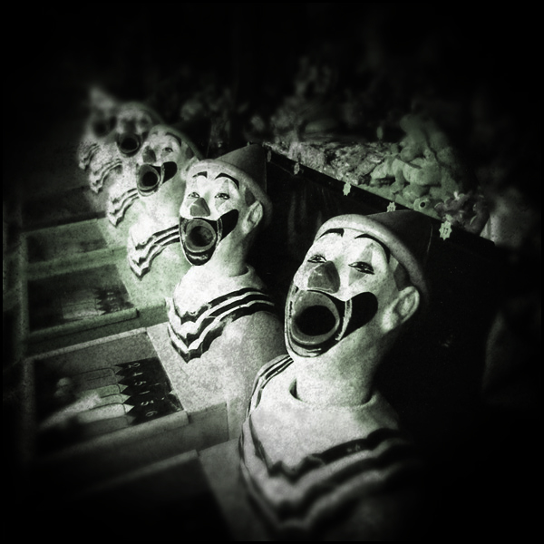Fairground Clowns, photography by Mark Hamilton. Holga. In Construction