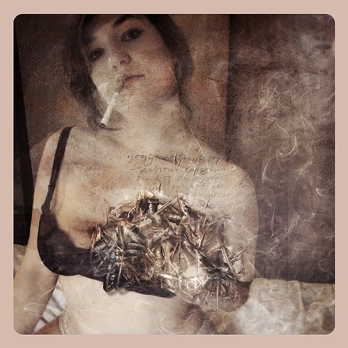 Lullaby., photography by Fleshy Limbless Spectacle. "Much male fear of feminism is the fear that, in becoming whole human beings, women will cease to mother men, to provide the breast, the lullaby, the continuous attention... Much male fear of feminism is infantilism-- the longing to remain the mother's son, to possess a woman who exists purely for him" 

-Adrienne Rich. 

---

Collaboration with my beautiful girl Camila a.k.a. reverse.paranoia [http://www.flickr.com/photos/reverseparanoia/], catlady, et al. 

You can take a look at the original pic here: http://www.flickr.com/photos/reverseparanoia/533567546/. Photoshop. O.C.D. overlaying