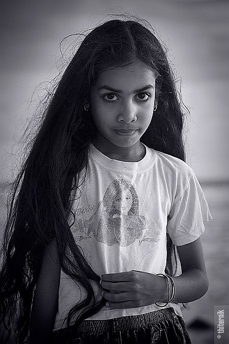 Little Mermaid, photography by Emma Grigoryan. I was watching the ocean in Flic en Flac, Mauritius on March 2010 and saw this girls with her mother or grandmother. They didn't speak English but I am lad I was able to take a portrait of this little mermaid of the Indian Ocean.. Canon 350D, Tamron 75-30mm. In People, Infant, children, Girl