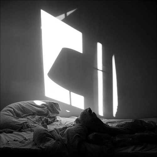 bed., photography by Sarolta M&aacute;rton. morning, bed and ipod.. Canon 30D