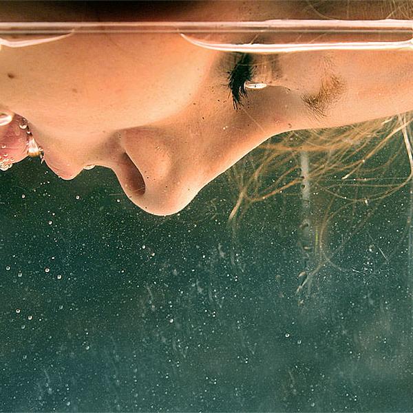 Apnoea, photography by Katharina F&ouml;sel. Another familiar feeling.

Everything around me goes by so fast. A rush of lights, a rush of images, a rush of words and a rush of thought. I want to stay still and listen, but I can't. I'm getting carried away by the flow.


I'm out of breath. I'm cold.





I think this is one of my trickies self-portraits I have ever done. I am the model and the photographer.
After manually adjusting the focus i stuck my head in a water tank and pressed the trigger.. Canon EOS 350 D , tripod. In People, Portrait