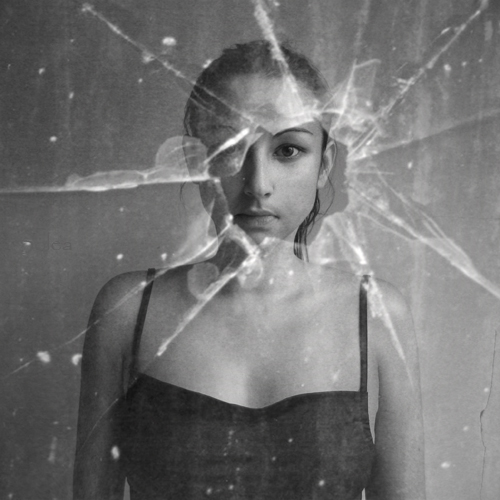 Broken window, photography by Carmen Gonzalez. In People, Portrait