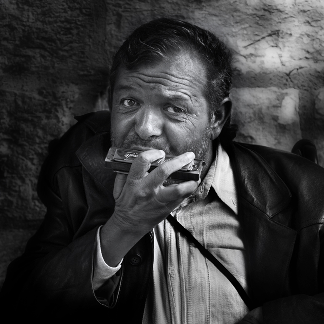 the harmonica player, Artwork by Vaggelis Fragiadakis. olympus e1. ps