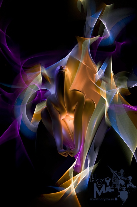 Ecstasy (Lightgraphic - Dynamic Light 2007), photography by Hory Ma. The photo is executed in technics &laquo;The painting of light&raquo; or &laquo;LightGraphic&raquo;, that assumes illumination of model by small light sources in darkness on long endurance.
Thus, all lightcloth (composition) - is one Photo Exposition, is embodied on a matrix of the camera in one click of a shutter.
The sketches very often executed in such a way further are drawn in the graphic editor as it would be on a canvas a brush. Plug-ins and filters are not used.
Use the technique of the light shift.

Shot story (in russian):
http://www.horyma.ru/forum/viewtopic.php?f=30&t=697. LightGraphic. In People, Nude