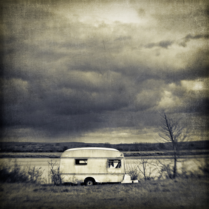 Better days, photography by Mark Sadlier. As in 'seen better days' - an old forgotten caravan used by agricultural workers in a field by the River Severn.. Homemade lens. In Transportation