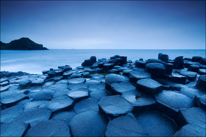 The Giants Causeway in Northern Ireland, taken 40 minutes before sunrise on a very cold and rainy day indeed.. In Nature, Scenery, Waterscape. Cold Dawn, photography by Benjamin Mercer. Image #76510