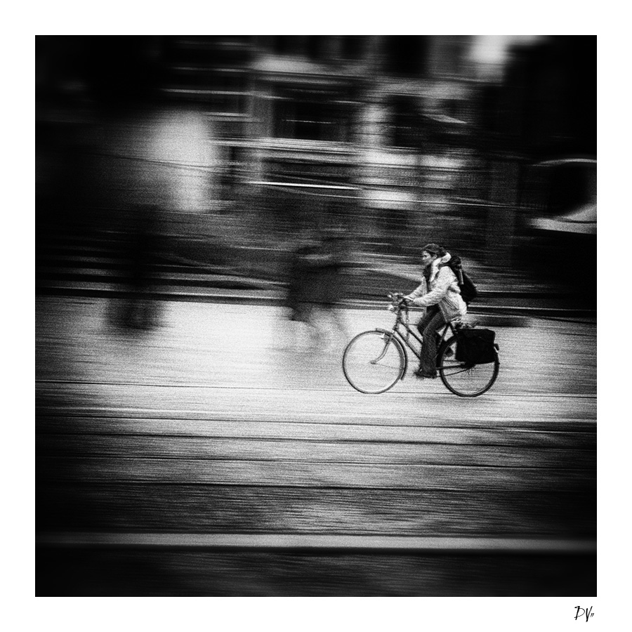 The Climb, photography by Dee Vee. Dam Square, Amsterdam. Olympus e1. CS5  / Lightroom. In People, Everyday, City life
