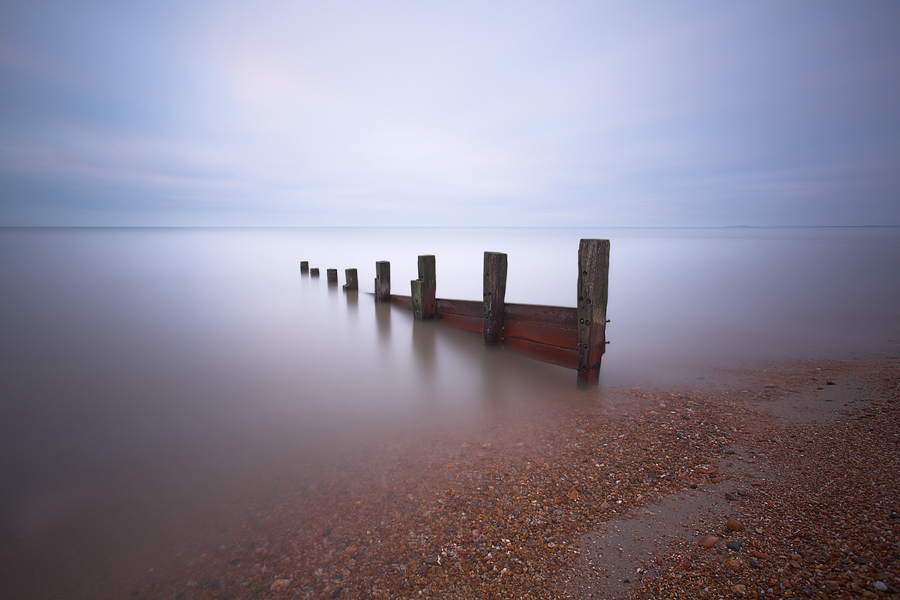Keyhaven Dawn, photography by David Baker. 6 minutes of Keyhaven dawn.

Up at 5am for the sunrise due at 6:20am. Muted skies and a very calm sea with some pinks and blues just after 6:30am which was when this was taken.
. 5D II & 17-40. In Nature, Scenery, Waterspace
