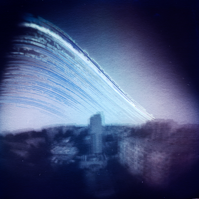 Pigeon Effect, photography by Danuta Turkiewicz. because the pigeons like this window-sill ;). self-made pinhole camera, solarography. from 28.06.2011 to 28.09.2011; paper: 20-years old fotonbrom. In Construction, Cityscape, skyline