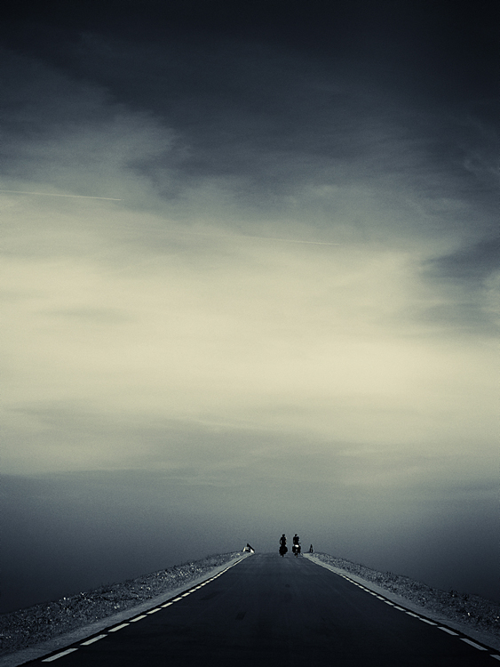 Together, photography by Marinus Wieten. Nikon D3X with 100 mm Carl Zeiss 2.0. Handheld t 1/60 f 5.6 ISO 100. In Transportation, Road, car, cycle