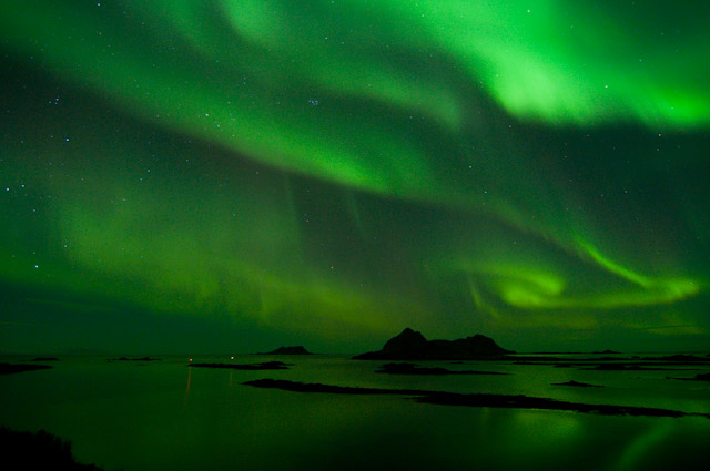 Untitled, photography by Ian Robins. On the 20 of Jan the sky was cloudy but as it cleared the light show started. I took 250 shots and have put them together in a film. These 3 are just a teaster. It was a fantastic night.
The pics are taken looking out over a perfectly calm sea on the south outer most corner of the vester&aring;len island a place called B&oslash;.. In Nature, Scenery, Waterscape