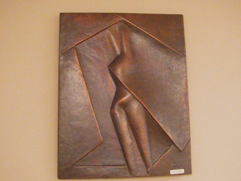 Abstract Nude, sculpture by Karam Haydy. Mohamed Rizk, Egyptian Sculptor. 
Many of his works placed in Egyptian and International Museums, in addition to art collectors all over the world. He was attracted to metals and fascinated and even captivated by copper, his works either hammered copper, steel or both combined. Rizk differs from most artists, in that he refuses to conform to one stable and repetitive style, his artistic development encompasses numerous technical abilities. His refusal to be cast in one known style or mode is a result of his great self honesty and penetration into a life that refuses to set itself in a solid cast .Thereby the variety and richness of his techniques as represented by the different points of viewing the same reality. In spite of the variance in techniques as represented by the different phases of Rizks artistic development, his vision is steadfast and centers around mankind, mankind is represented through heroic poetry, bravery, stalwartness, sadness, resistance, depth, happiness and beauty. 
Biography
Mohamed Rizk, Egyptian Sculptor.
1937 Born in a village near Damietta 
1959 Worked at the Egyptian Iron & Steel factory, where       he discovered the medium of Copper that held his          attention to the present day. Self taught following only his inborn talent and learning from the copper craftsman that is still present in modern day Egypt
1962 awarded the encouragement prize (Ministry of     Culture), thereafter closely followed by the media in Egypt
1964 First one man show exhibit at wekalet El Ghouri
1965 Awarded the Nations Grant for the Arts until 1975. 
1967 Participated in the Egyptian Contemporary Art Exhibit in Paris and Brussels.
1968 Participated in the United Arab League Exhibition for the human rights, Beirut.
1969 Second one man show Exhibit at Goethe Institute, Cairo, Egypt. Commissioned to do 90 works for the Sheraton Hotel of Cairo.
1970 Designed and erected a monumental brass work (25 sq. meters) for the entrance of the Ahram newspaper building.
1971 Commissioned by the Egyptian Army to design and execute the National emblems on army buildings.
1972 Trip to Europe to study its museums. Finished three large works for the Meridian Hotel in Cairo.
1973 Finished a major work for the entrance of the Ministry of Military Production.
1976 Involved with the execution and magnification of Marwan Ebn Mohamed Kettle (a major Islamic Relic).
1979 Major exhibit at the National Hall of fine Arts.
1980 Executed his large copper horse.
1982 Finished a large work for the entrance of the Nile Hilton Hotel in Cairo.
1983 The Ministry of Culture Published a documentary of his life and art work.
1984 Completed another major work for El Nasr Auto manufacturing building.
1985 Completed major works for public places. 
1986 Major exhibit at Ikhnaton Gallery.
1987 Sculpture for the Export Bank of Cairo.
1988 Exhibited as a representative of modern Egyptian art accompanying the exhibition of Ramses the second at the Denver Museum of National History, held a series of exhibitions in five American states.
1989 &ndash;1990 Completed major work for Nile Romance Hotel in Cairo.
1992-1993 Completed three works for the Marriot Hotel in Sharm El Sheikh, Ahram newspaper building, and sofotel hotel in Hurgada.
1995-1996 Completed a major work at the Western Egyptian Gates.
1997-1998 Completed his huge village girl at city square in Sharm El Sheikh.
1999 Completed his famous feminine violin and the seated Troubadour (Rababa Player) in the Egyptian Opera house garden.
2000 Finished two major wall pieces for the Military Pilots College, and Almaza Military airport hall.
2001 Completed the birds of freedom in the Youth Center for Creation in the Opera House, Cairo.
2002 Finished his six Horses for Dubai Airport.
2005-2006 Completed his major wall piece (Havilland plane), and the village girl in Terminal three at Cairo Airport.
2008 Passed away.
  If you have any question please email us at (karam3499@yahoo.com )
. Manual Tools special for hammered copper. Handmade from hammered copper. In People, Body part