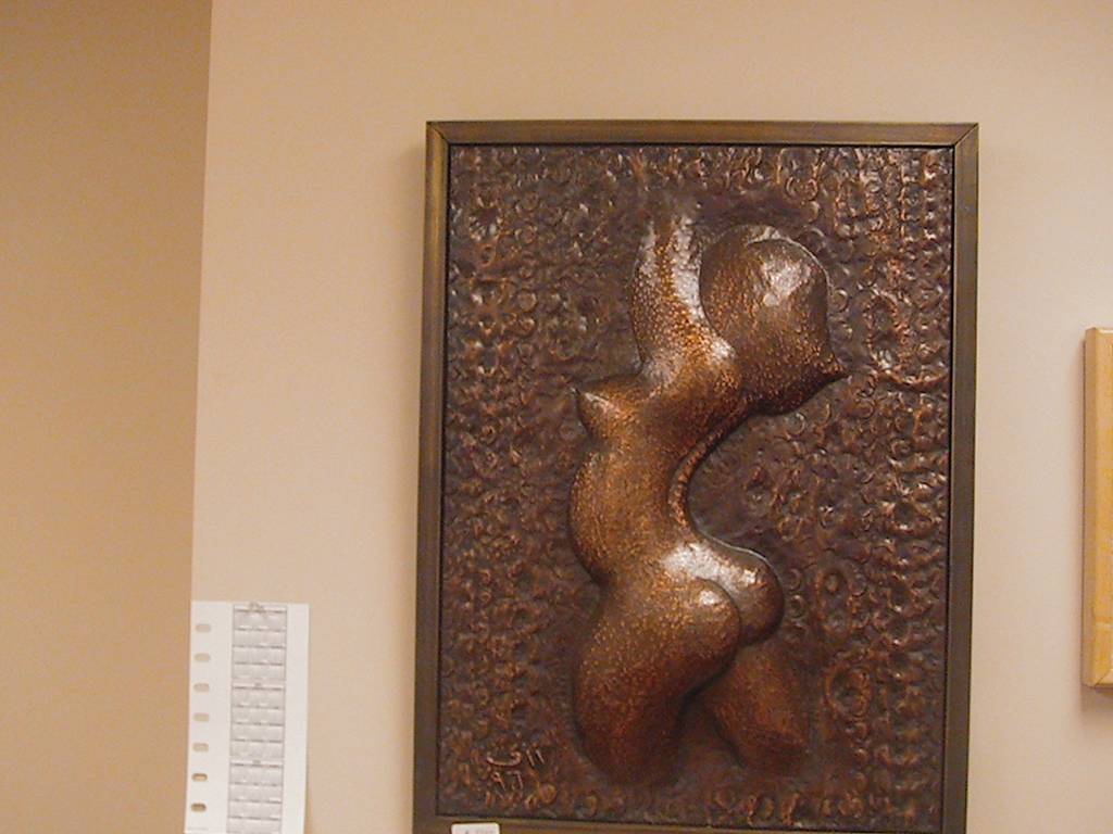 Nude Body, Artwork by Karam Haydy. Mohamed Rizk. 
Many of his works placed in Egyptian and International Museums, in addition to art collectors all over the world. He was attracted to metals and fascinated and even captivated by copper, his works either hammered copper, steel or both combined. Rizk differs from most artists, in that he refuses to conform to one stable and repetitive style, his artistic development encompasses numerous technical abilities. His refusal to be cast in one known style or mode is a result of his great self honesty and penetration into a life that refuses to set itself in a solid cast .Thereby the variety and richness of his techniques as represented by the different points of viewing the same reality. In spite of the variance in techniques as represented by the different phases of Rizks artistic development, his vision is steadfast and centers around mankind, mankind is represented through heroic poetry, bravery, stalwartness, sadness, resistance, depth, happiness and beauty. 
Biography
Mohamed Rizk, Egyptian Sculptor.
1937 Born in a village near Damietta 
1959 Worked at the Egyptian Iron & Steel factory, where       he discovered the medium of Copper that held his          attention to the present day. Self taught following only his inborn talent and learning from the copper craftsman that is still present in modern day Egypt
1962 awarded the encouragement prize (Ministry of     Culture), thereafter closely followed by the media in Egypt
1964 First one man show exhibit at wekalet El Ghouri
1965 Awarded the Nations Grant for the Arts until 1975. 
1967 Participated in the Egyptian Contemporary Art Exhibit in Paris and Brussels.
1968 Participated in the United Arab League Exhibition for the human rights, Beirut.
1969 Second one man show Exhibit at Goethe Institute, Cairo, Egypt. Commissioned to do 90 works for the Sheraton Hotel of Cairo.
1970 Designed and erected a monumental brass work (25 sq. meters) for the entrance of the Ahram newspaper building.
1971 Commissioned by the Egyptian Army to design and execute the National emblems on army buildings.
1972 Trip to Europe to study its museums. Finished three large works for the Meridian Hotel in Cairo.
1973 Finished a major work for the entrance of the Ministry of Military Production.
1976 Involved with the execution and magnification of Marwan Ebn Mohamed Kettle (a major Islamic Relic).
1979 Major exhibit at the National Hall of fine Arts.
1980 Executed his large copper horse.
1982 Finished a large work for the entrance of the Nile Hilton Hotel in Cairo.
1983 The Ministry of Culture Published a documentary of his life and art work.
1984 Completed another major work for El Nasr Auto manufacturing building.
1985 Completed major works for public places. 
1986 Major exhibit at Ikhnaton Gallery.
1987 Sculpture for the Export Bank of Cairo.
1988 Exhibited as a representative of modern Egyptian art accompanying the exhibition of Ramses the second at the Denver Museum of National History, held a series of exhibitions in five American states.
1989 &ndash;1990 Completed major work for Nile Romance Hotel in Cairo.
1992-1993 Completed three works for the Marriot Hotel in Sharm El Sheikh, Ahram newspaper building, and sofotel hotel in Hurgada.
1995-1996 Completed a major work at the Western Egyptian Gates.
1997-1998 Completed his huge village girl at city square in Sharm El Sheikh.
1999 Completed his famous feminine violin and the seated Troubadour (Rababa Player) in the Egyptian Opera house garden.
2000 Finished two major wall pieces for the Military Pilots College, and Almaza Military airport hall.
2001 Completed the birds of freedom in the Youth Center for Creation in the Opera House, Cairo.
2002 Finished his six Horses for Dubai Airport.
2005-2006 Completed his major wall piece (Havilland plane), and the village girl in Terminal three at Cairo Airport.
2008 Passed away.
  If you have any question please email us at (karam3499@yahoo.com )
. Manual Tools special for hammered copper. Handmade from hammered copper