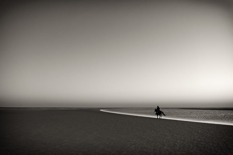A Rider At The Sea, photography by Ralph Graef. Canon 5DII, 24-105@24 mm. In Nature, Scenery, Beach. A Rider At The Sea, photography by Ralph Graef. Image #237916