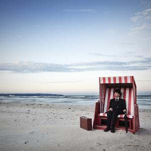A Rest At The Beach by Ralph Graef