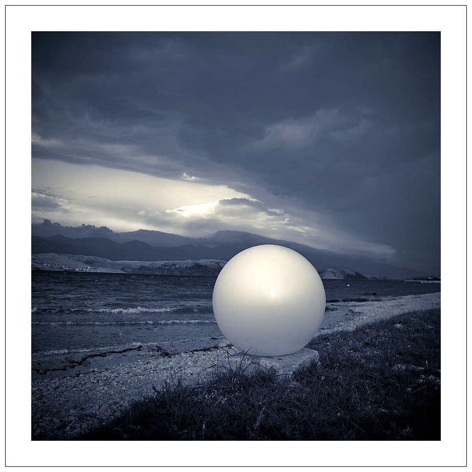 pearl, photography by Mario Blazevic. Here's little story how this picture was made...
earlier this year (april) i was walking deserted beach on Island of Pag and stumbled upon a discarded bowl that goes on lamp...

i played a bit with it... punchig it across beach and photographing :). e410. cyanotype. In Nature, Scenery, Waterscape