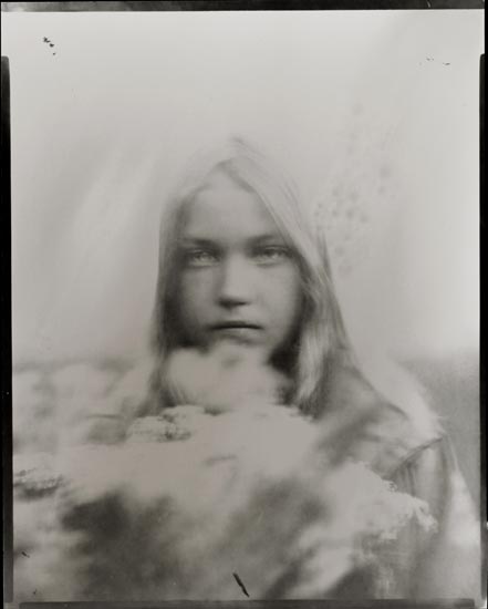 flowers, photography by Benjamin Goss. From a selection of portraits taken with a 8x10 inch (20x25cm) view camera from 1904.  Im using silver gelitin paper as a negative then contact printing to another sheet in the darkroom.  The exposures range from a couple seconds to minute or two.  100% darkroom, no layers, textures, or photoshop.. 8x10 inch (20x25cm) kodak view camera. Silver gelitin paper as negative. In People, Portrait