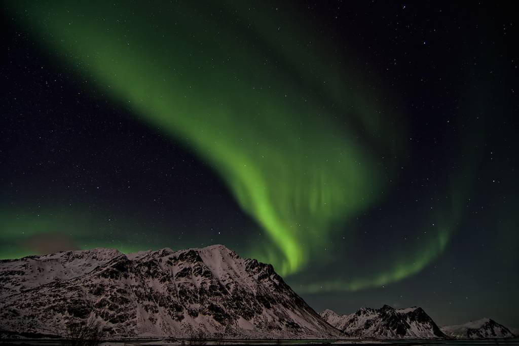 Sublimated Souls, photography by Alessandro Rovelli. It is said that the natives Scandinavian regarded thesemysterious  halos (Northern Lights) as the spirit of the dead leaving earth.
A pic taken in Lofoten Islands. Pentax K5. Numerique. In Nature, Sky