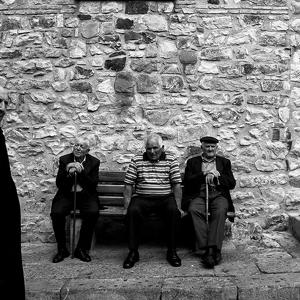 Three old men and a priest in Geraci Siculo