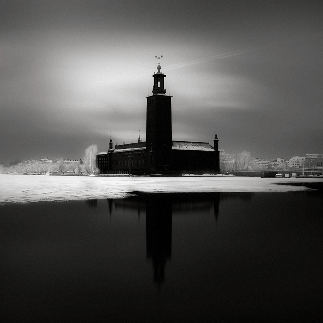 Stockholm City Hall, wrapped in snow, frost, and ice, on a cold January afternoon. A bit different from my other long exposures... So difficult to do minimalism in the middle of a big city :-). Nikon D3. Very long exposure. In Construction, Edifice, Building. City Hall, photography by Maria Str&ouml;mvik. Image #193829