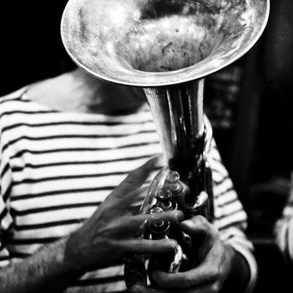 Brass Banda Rythm, photography by Pierre-olivier Mazoyer. the evening of the new Beaujolais wine (3rd thursday of november) is a classic celebration night in France. In the south west region, we add Banda concerts to it. 

I tried to capture the spirit of the banda concerts, through the a simple graphic layout, showing the brass instrument and its texture.. canon 5D mark II. ambient bar light, slow shutter speed.. In Event, Music, Concert