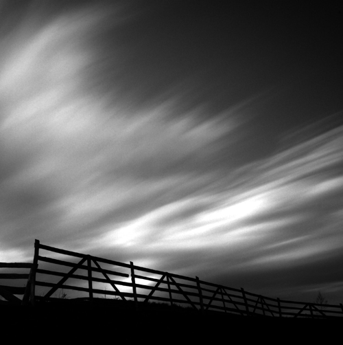 Canon 30D. Long exposure. In Nature, Sky. Clouds Over Fence, photography by Calin Paul Oprea. Image #201319