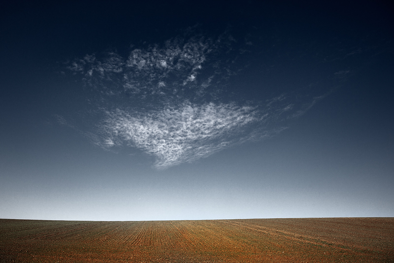 In the more or less "rolling hills" of the endless farmland area in Mecklenburg-Vorpommern, north of Berlin. - New addition to my project "Rural Space".. Canon EOS 5DMkII, EF 24-105mm, Pol-filter. Raw, PS CS5. In Nature, Scenery, Countryside. Rural Space: Wide Fields And Fluffy Clouds, photography by Bernd Walz. Image #410546