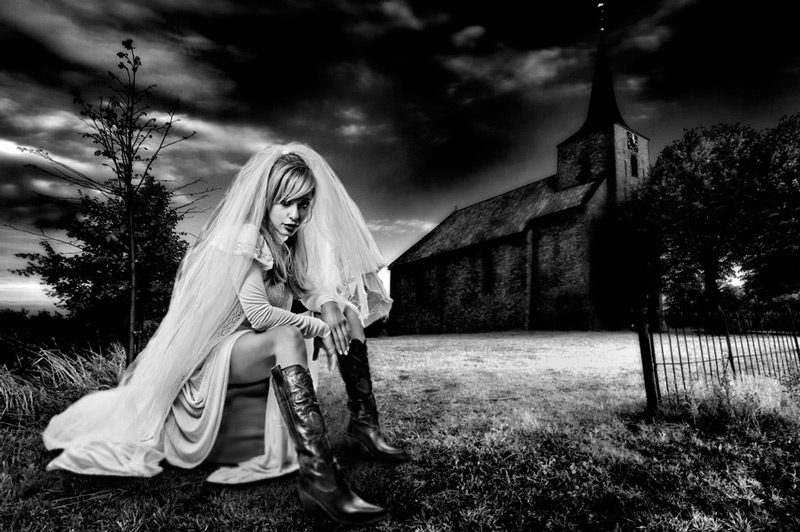 Kill Bill, photography by Marco Orma. Model: Veronica Rega (protagonist of GF5)

Strobist: Beauty Dish as my overhead light, 2 sofbox 60x90cm behind left and right with grids from the sides. 

Background add in post.. nikon D300, 17-55 f2.8, 2 sofbox, beauty dish. In People, Portrait, Female