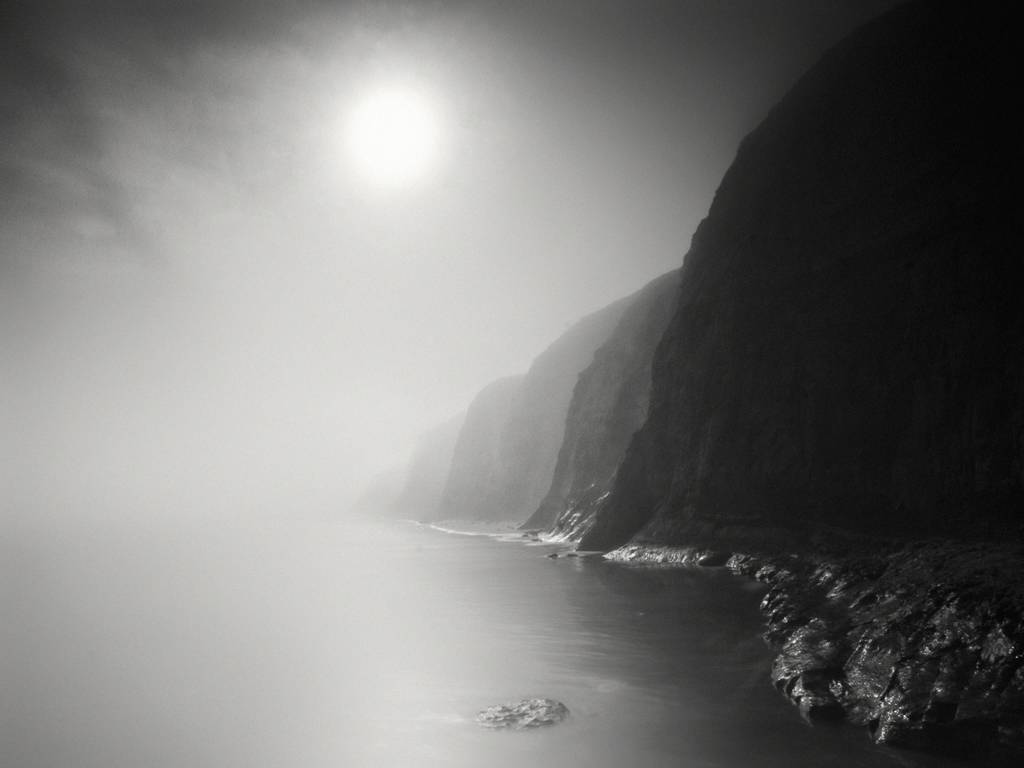 The fog suddenly rolled in, and the light refused to yield .... Sony Alpha 700, 11-18mm Wide Angle Lens, Lee Big Stopper, Lee .9 ND Grad, Lee .6 ND Grad. Long Exposure. And The Fog Rolls In, image by Nathan Wirth. Image #376801