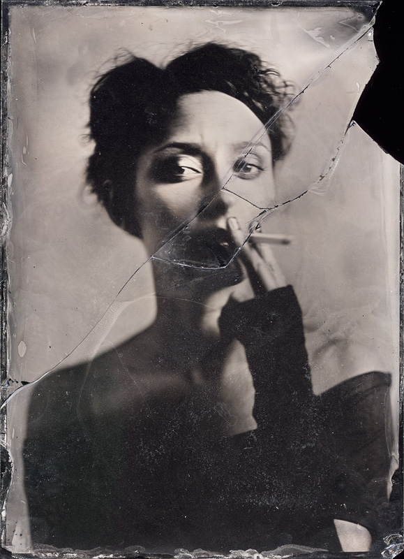 Unfortunatelly I was clumsy and it felt down on the floor breaking into pieces, so here it as and ambrotype puzzle :). Globica 13x18, Zeiss 250/4.5. wet plate collodion. In People, Portrait, Female. Smoking Alice, photography by Maciek Leśniak. Image #359447