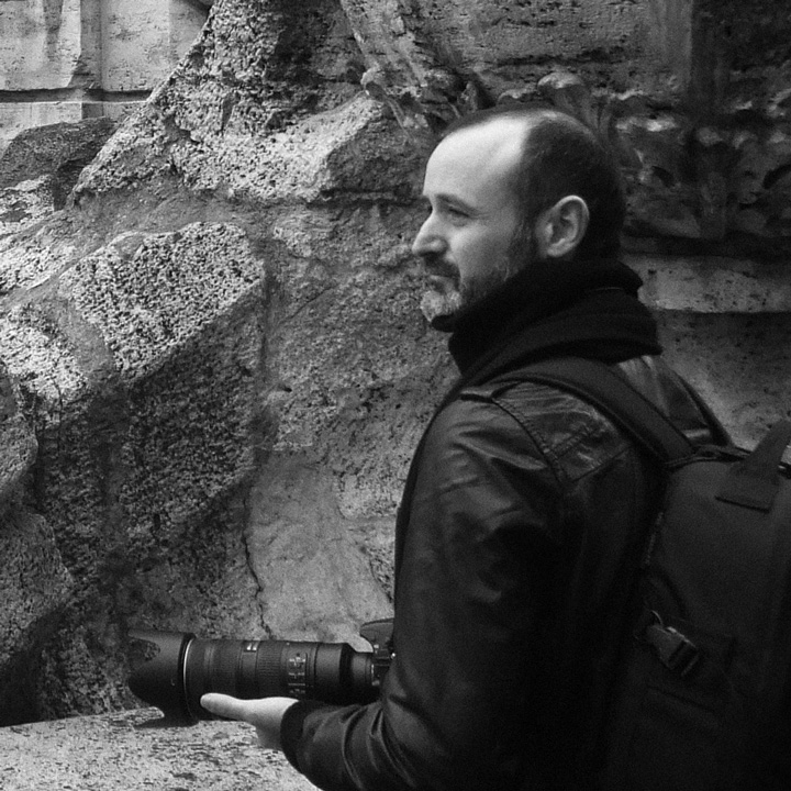 A candid shot taken by a friend of mine while I was shooting in the Trevi Fountain (Roma).. Nikon D300s + Nikon 70/210mm ƒ1:2.8. Taken by a paparazzi. In People, Self-portrait, Male. Selfportrait, photography by Aurelio Monge. Image #319367