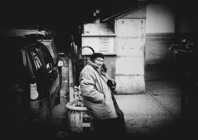 Thank you.I did this photo while walking, I know it's not a masterpiece.But I did want that, I just wanted to capture her face, her posture, I just couldn't go further without taking a photo.Well she looked at me when I pointed my camera towards her.I still think of what that look wants to tell.I just had to post it.. Zenit E + Helios-44-2 f2/58mm lens. Street Photography. The Unspoken Words, image by Alex Cruceru. Image #392656