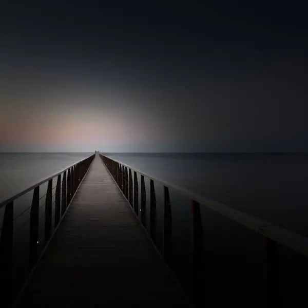 Dusk on the pier by Walter Caterina