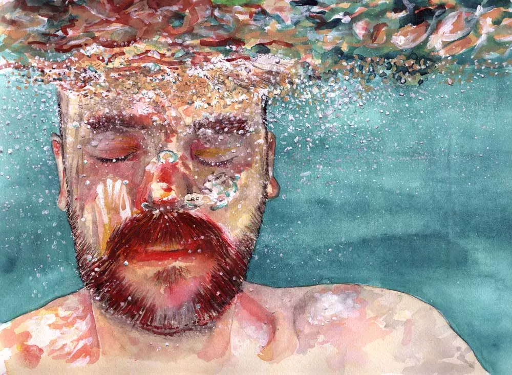 man underwater drawing