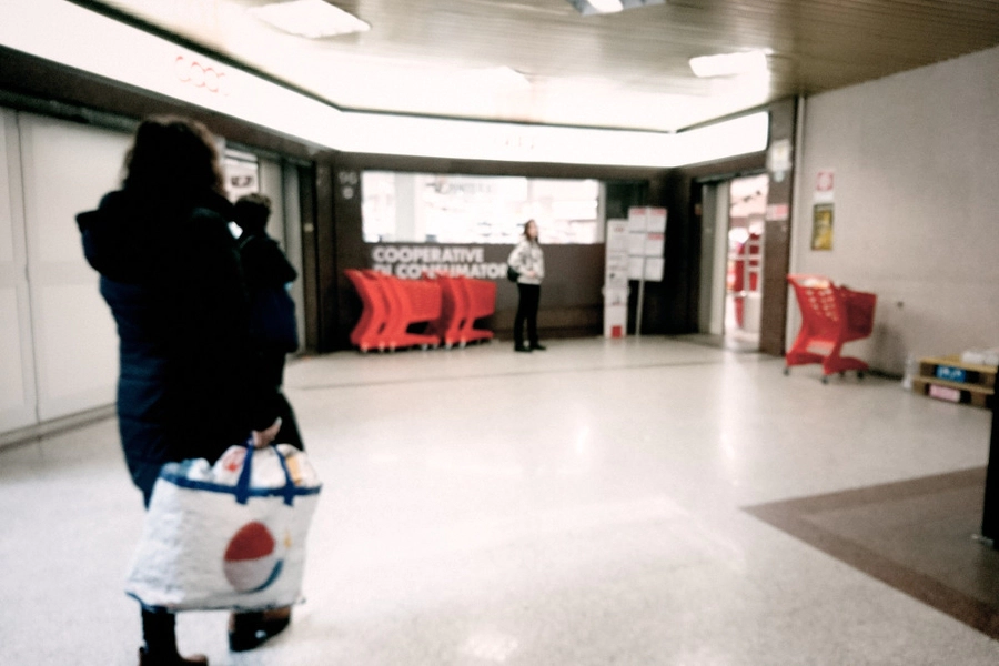 Coronavirus line outside a supermarket is a creation by the artist Johannes Beilharz. Category art work. A photo that illustrates everyday life in the days of Coronavirus in Rome, Italy. Sony Xperia X1 and Vignette for Android. High-resolution mobile phone…