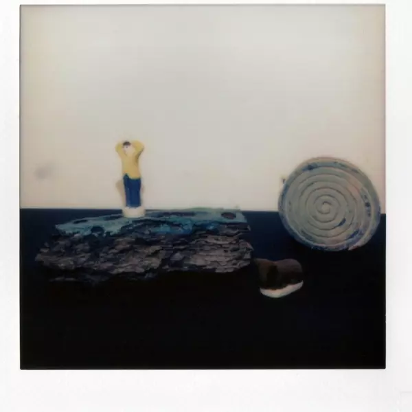 Man in miniature landscape by Johannes Beilharz