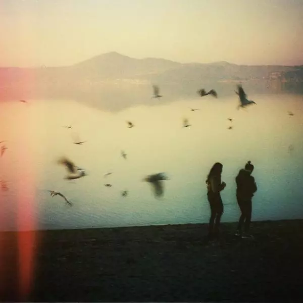 Two girls and a smattering of wings by Johannes Beilharz
