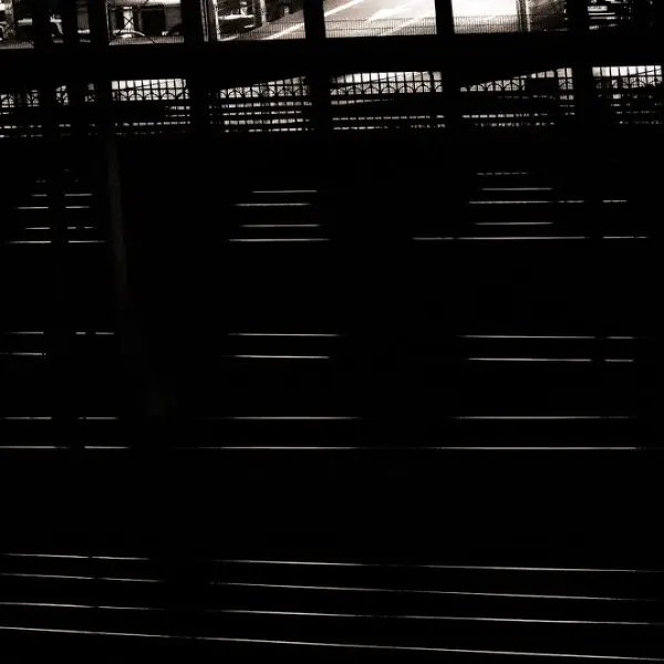 Parking lot near the railway by Alex Lo